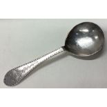 An 18th Century Norwegian silver spoon with engraved floral decoration to terminal.