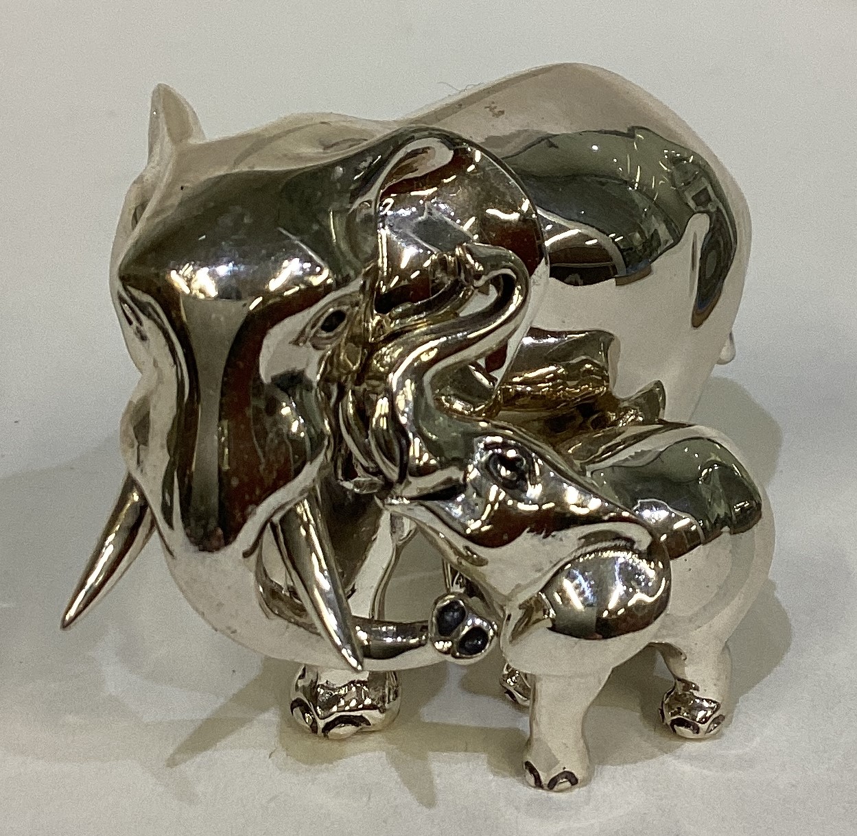 A rare silver figure of an elephant and calf. - Image 2 of 4