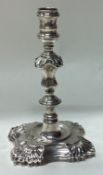 An 18th Century George II silver taperstick.