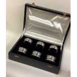 CHESTER: A cased set of six silver napkin rings.