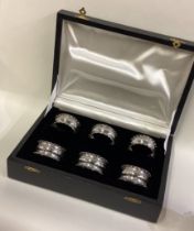 CHESTER: A cased set of six silver napkin rings.