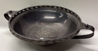 An Art Deco silver presentation bowl with pierced decoration.