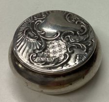 A French silver pill box with hinged lid.
