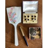 A silver and enamelled mirror, cufflink set etc.