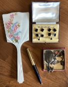 A silver and enamelled mirror, cufflink set etc.