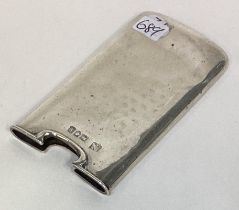 A stylish silver card case of shaped form. London.