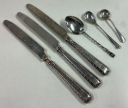 A collection of silver handled knives, teaspoon, salt spoons etc.