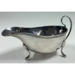 An Edwardian silver sauce boat of typical form.