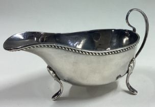 An Edwardian silver sauce boat of typical form.