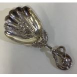 A rare naturalistic Victorian silver caddy spoon.