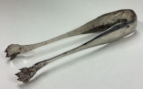 A large pair of Continental silver claw ice tongs.