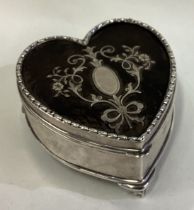 A heart shaped Edwardian silver and tortoiseshell jewellery box.
