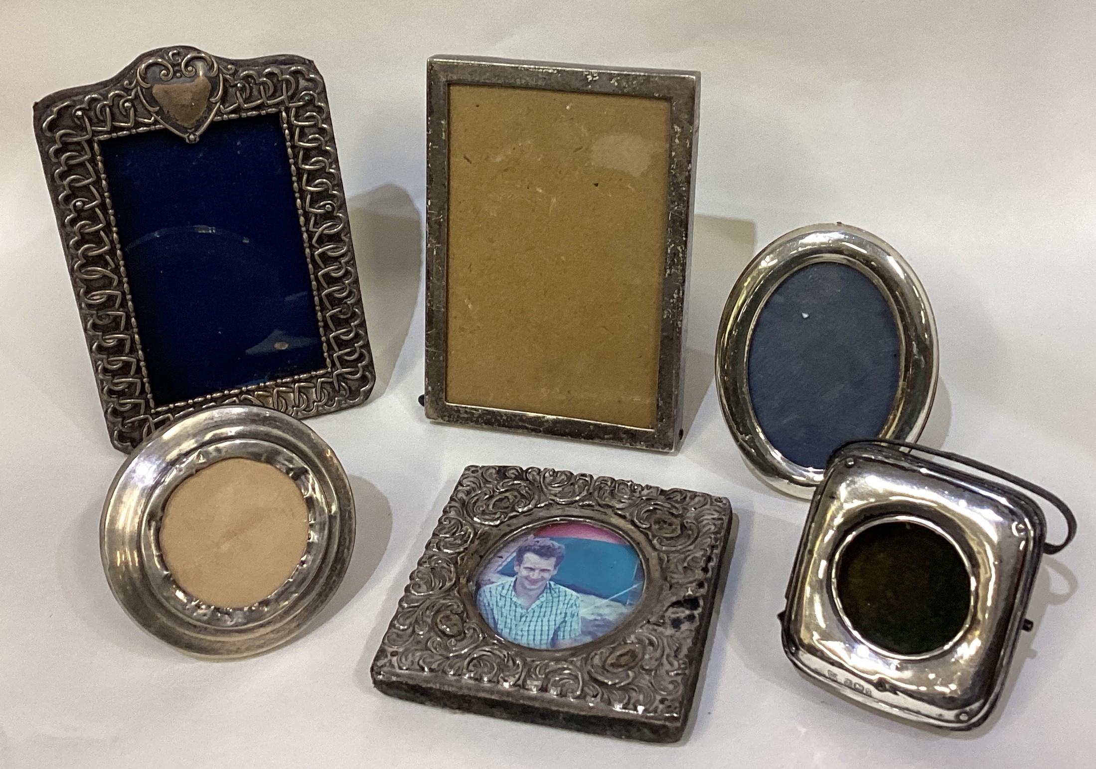 A collection of six silver mounted picture frames.