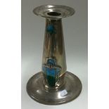 A stylish silver and enamelled candlestick. London.