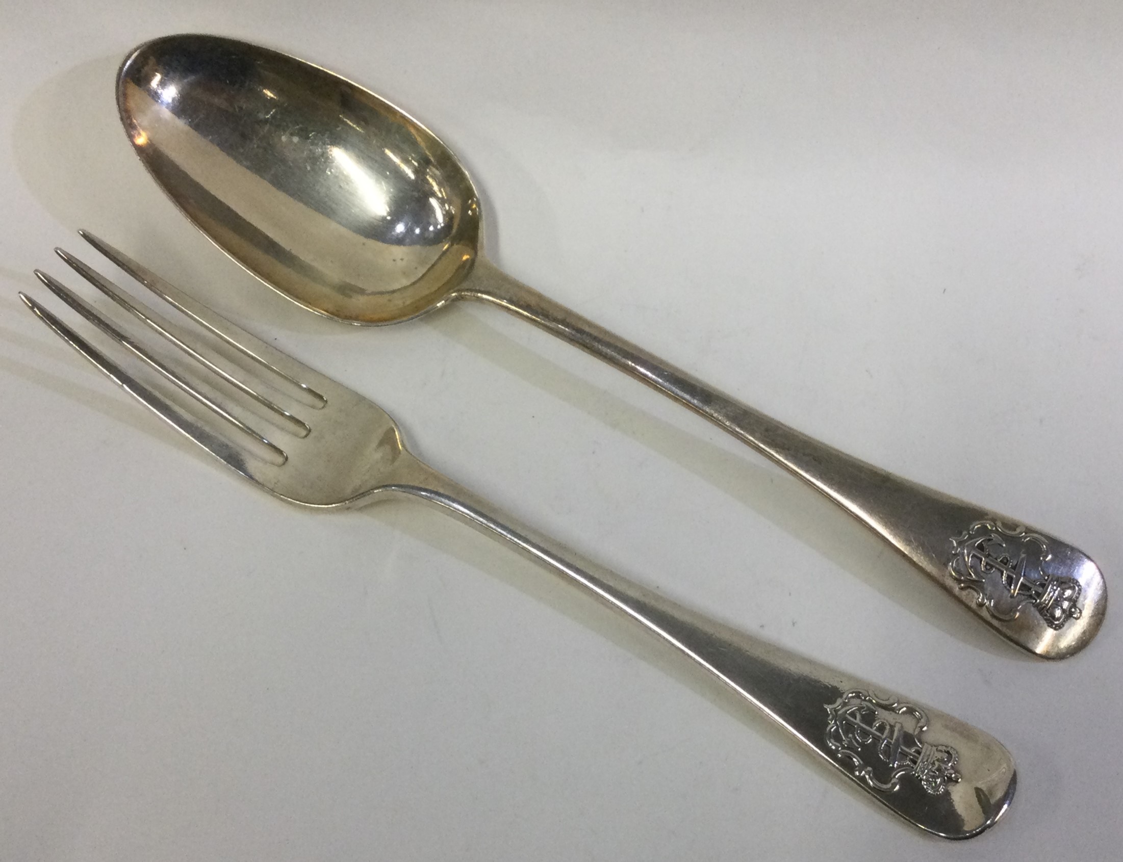 A rare silver Admiralty pattern spoon and fork.