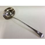 A George III silver soup ladle. London 1803.