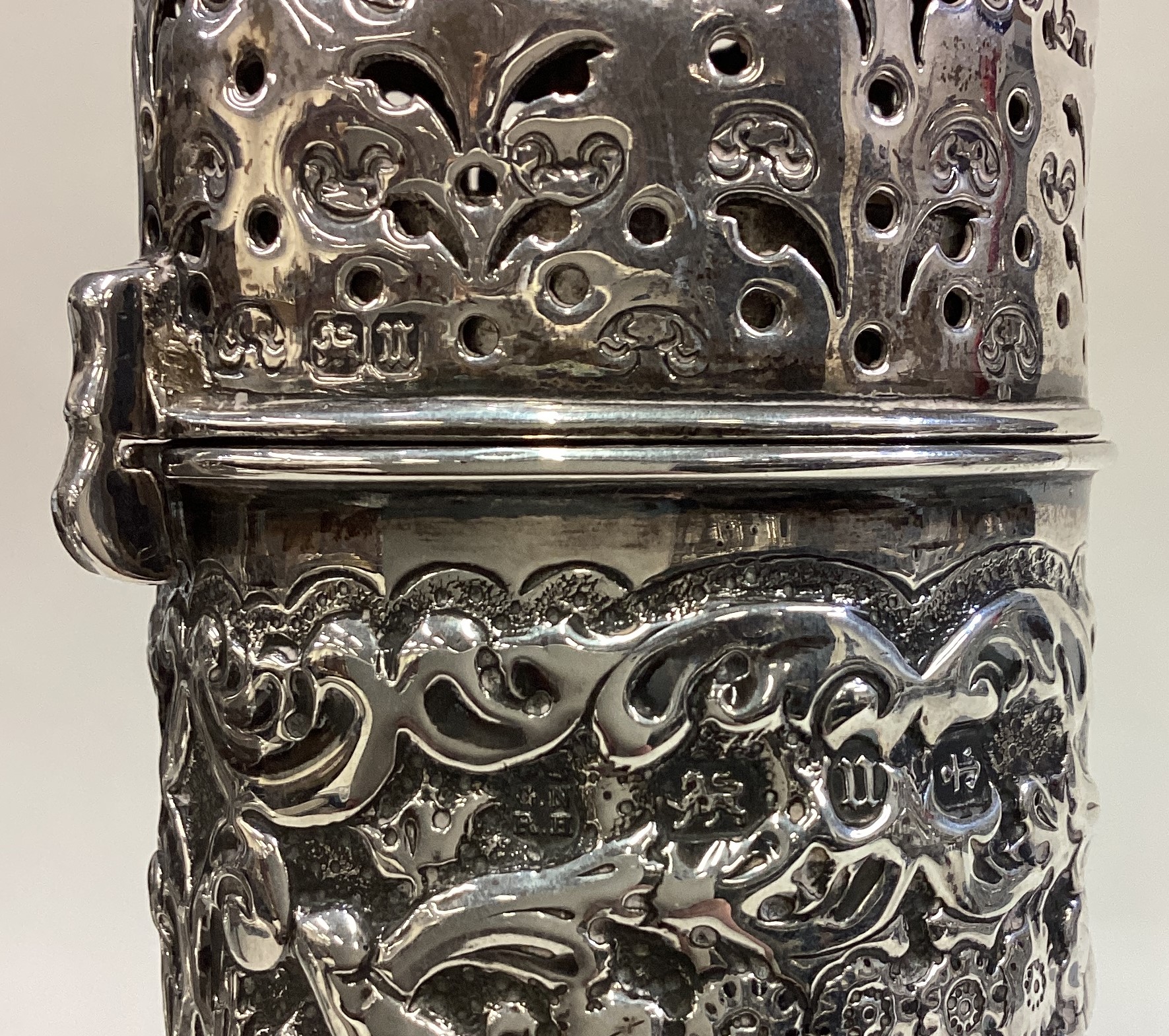 A Victorian silver sugar caster with chased decoration. - Image 3 of 3