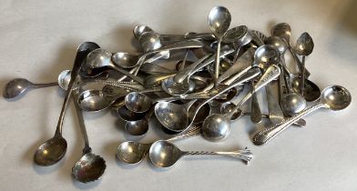 A good collection of silver salt and mustard spoons.