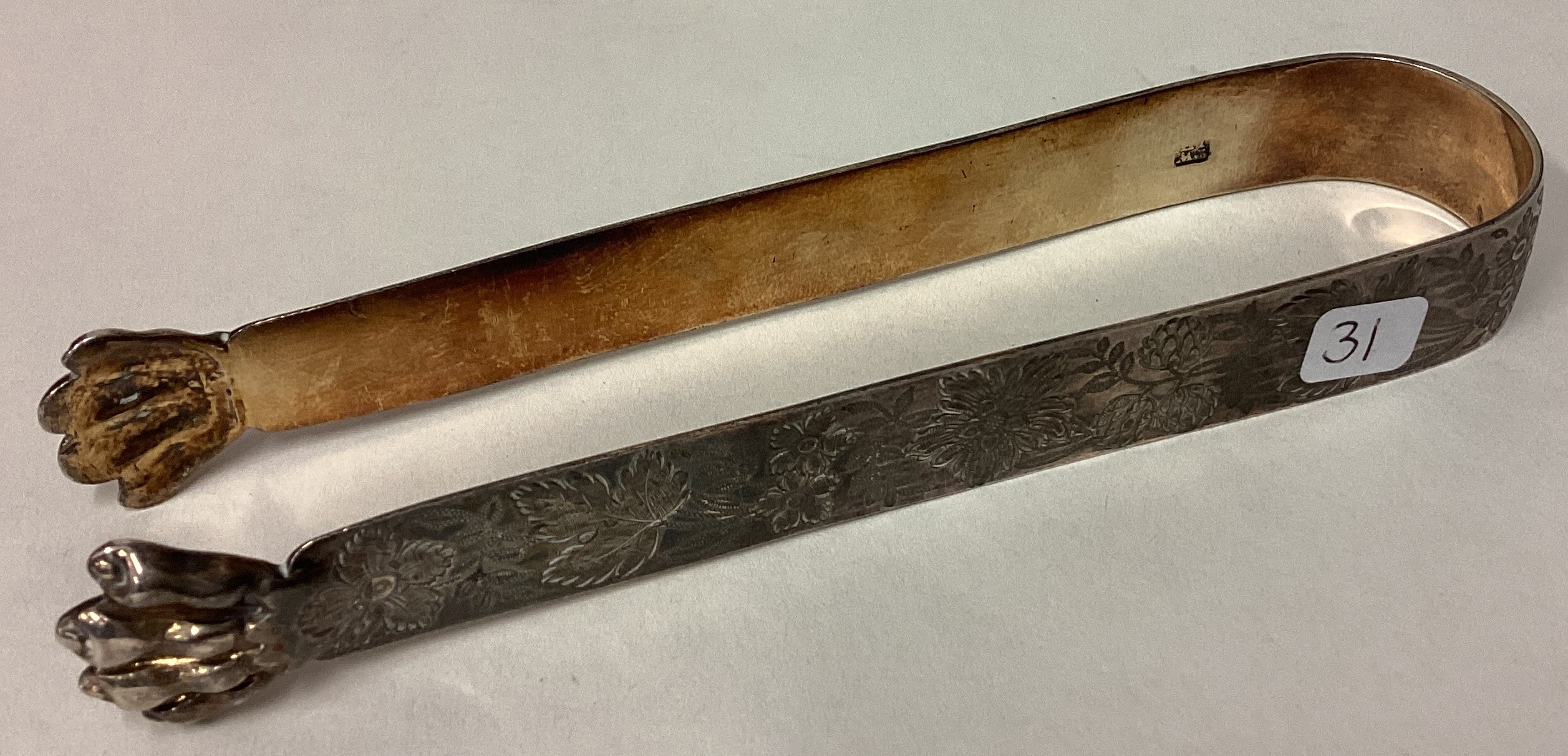 A rare pair of George III silver claw ice tongs engraved with floral decoration. - Image 2 of 2