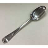 A George II silver bottom marked tablespoon.