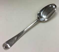 A George II silver bottom marked tablespoon.