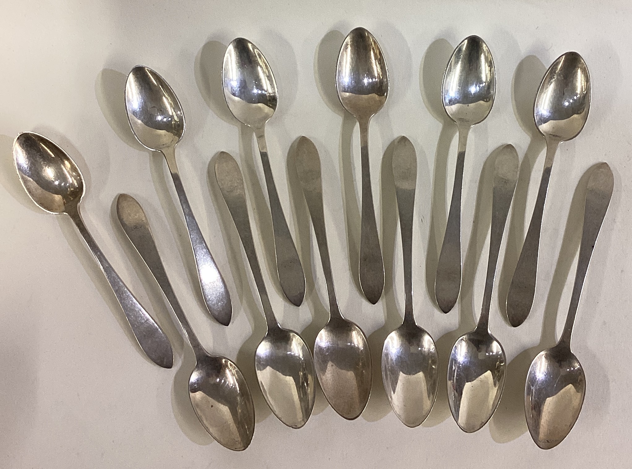 TIFFANY & CO: A set of twelve spoons.