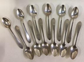 TIFFANY & CO: A set of twelve spoons.