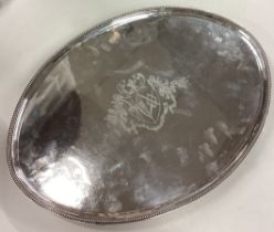 A massive oval George III silver tray. London 1786.