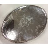 A massive oval George III silver tray. London 1786.