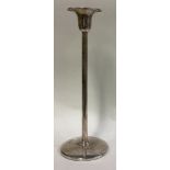 A large contemporary silver candlestick.