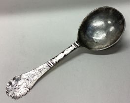An 18th Century Norwegian silver spoon with engraved floral decoration.