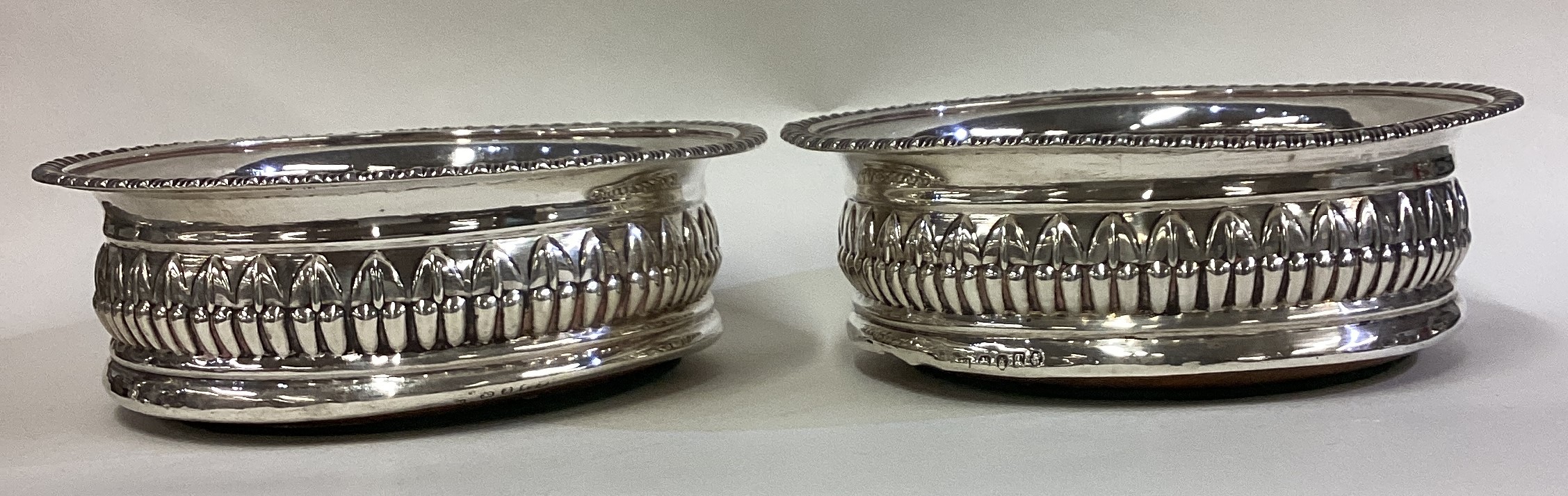 A large pair of George III silver coasters. - Image 2 of 3