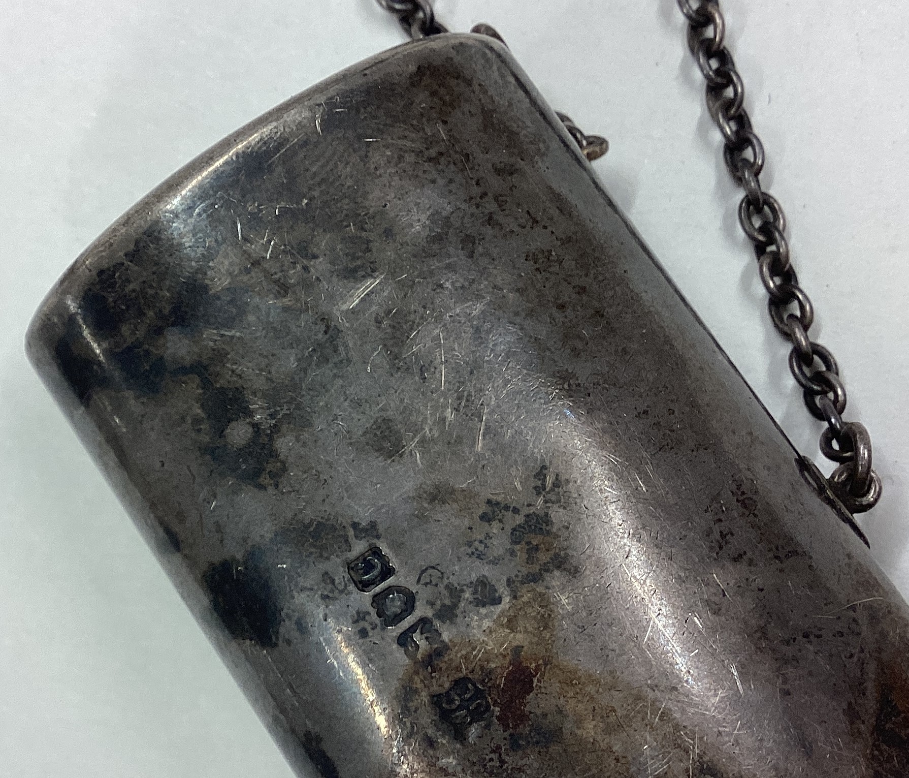 A Victorian silver combination snuff box / cigar cutter on suspension chain. - Image 2 of 3