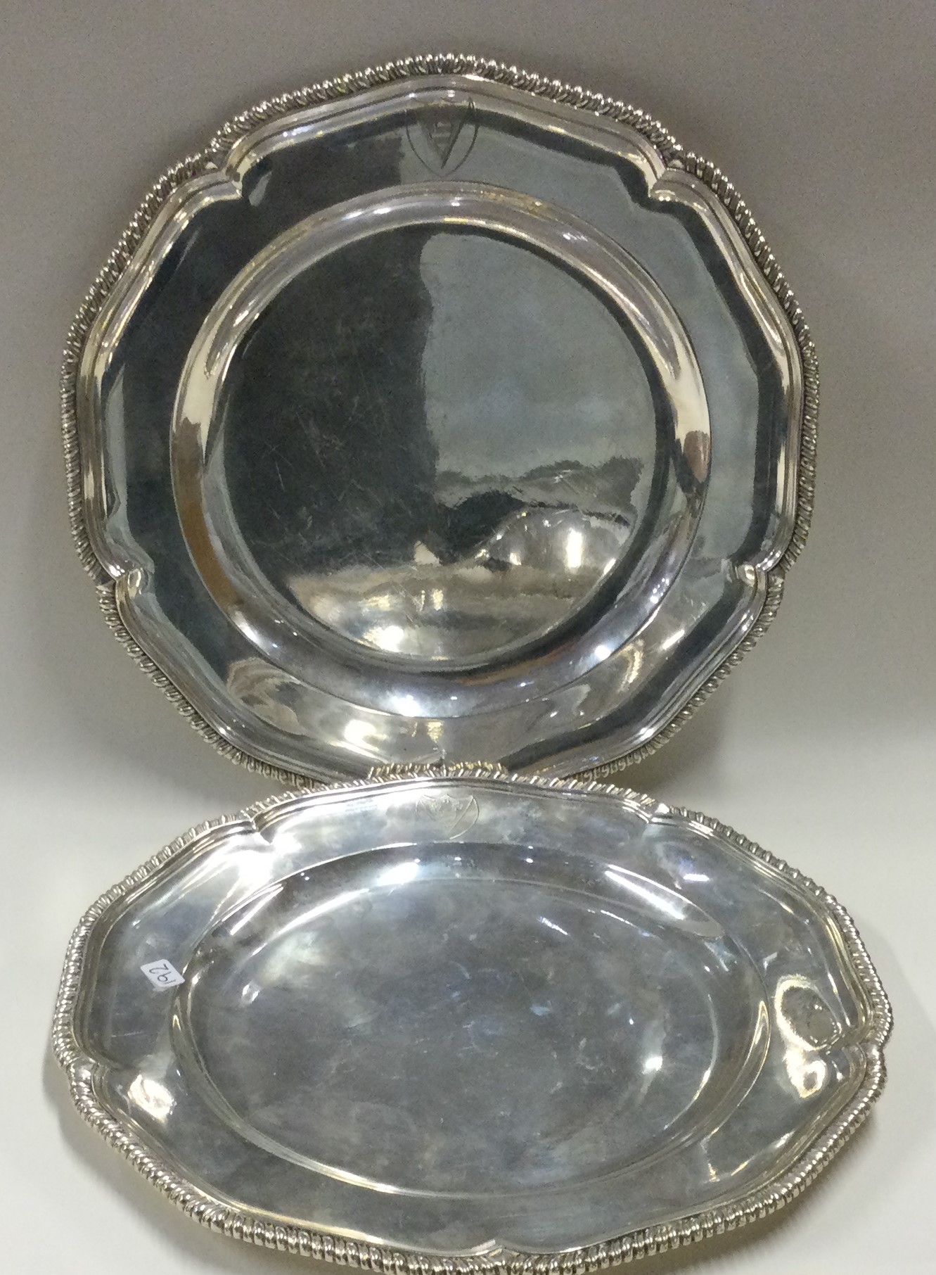 A good pair of silver dinner plates. London 1746.