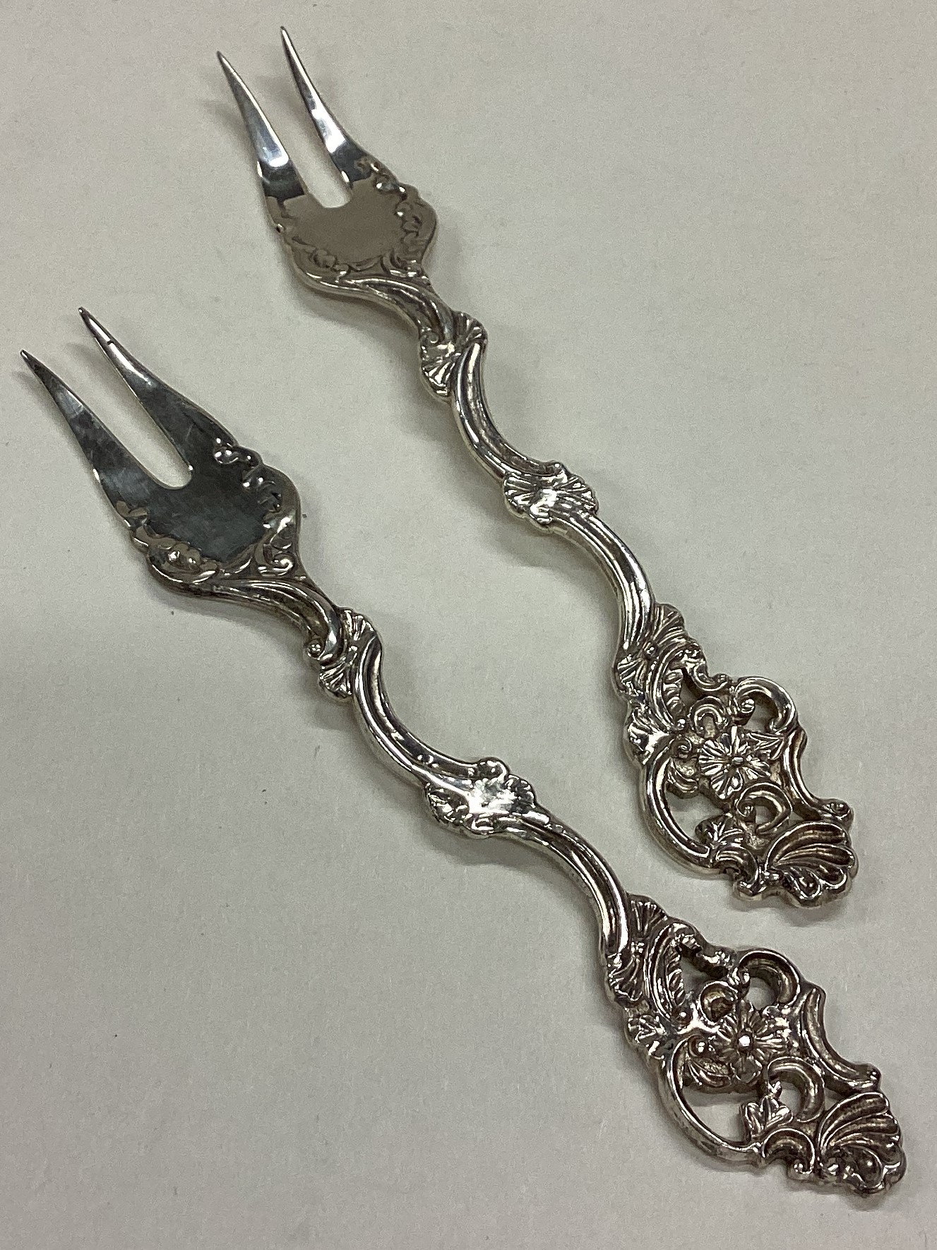 DUBLIN: A rare pair of Irish silver pickle forks.