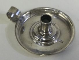 An early silver miniature chamberstick. Circa 1725.