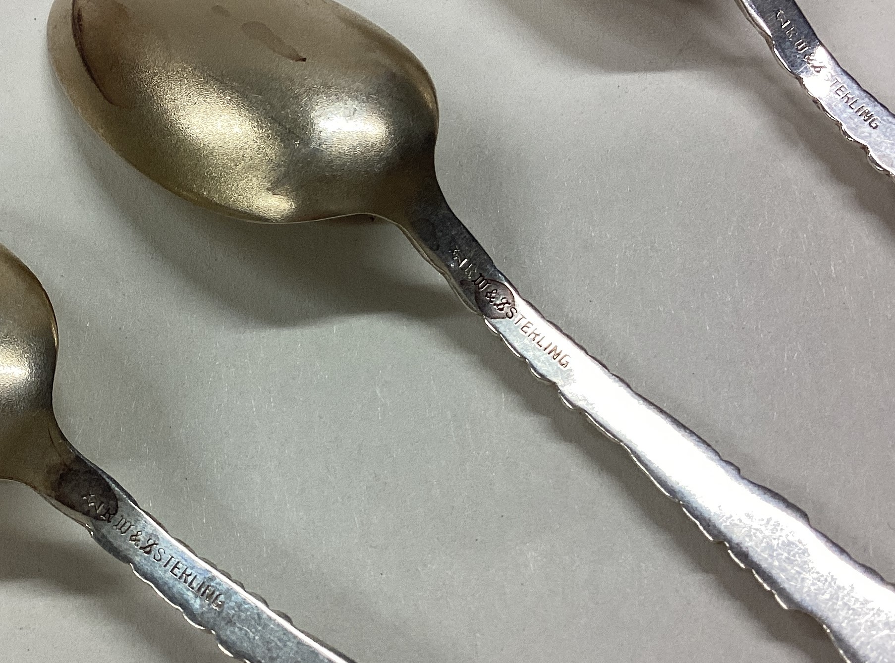 A set of six American silver spoons embossed with flowers and butterflies. - Image 3 of 3