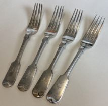 EXETER: A heavy set of four silver fiddle pattern dessert forks.