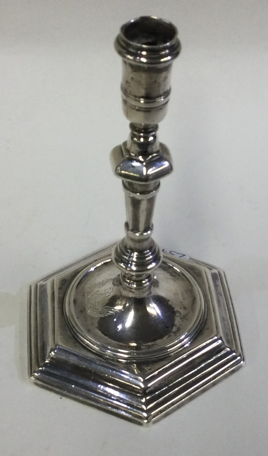A George II silver taperstick with central armorial. - Image 2 of 3