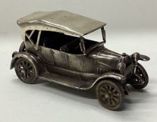An Italian silver model of a car.