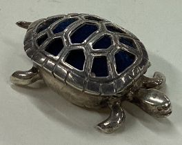 A rare silver pin cushion box in the form of a tortoise.