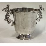 An 18th Century silver two-handled cup.