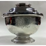 An 18th Century George II sugar bowl with lift-off cover.