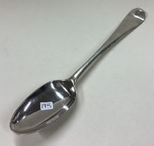 A George II silver bottom marked tablespoon.