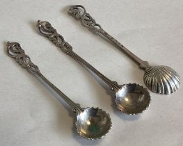 A set of three Victorian silver salt spoons with pierced decoration.