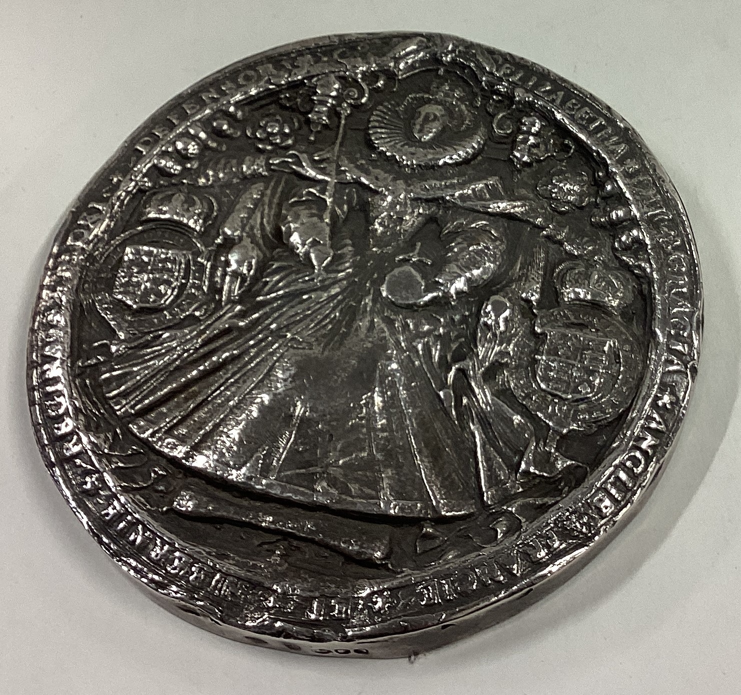 A rare and large silver medallion commemorating Elizabeth I.