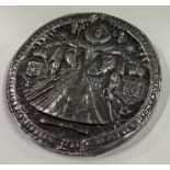 A rare and large silver medallion commemorating Elizabeth I.