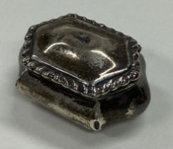 A silver pill box with hinged lid. Birmingham.