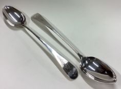 HESTER BATEMAN: A large pair of silver serving spoons.