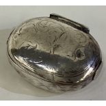 A 17th Century William and Mary silver squeeze sided snuff box.